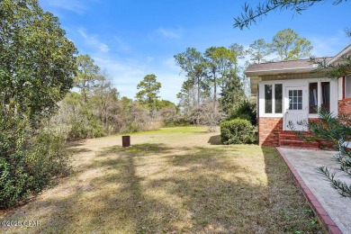 Discover the perfect blend of comfort and tranquility in this on Dogwood Lakes Golf Club in Florida - for sale on GolfHomes.com, golf home, golf lot