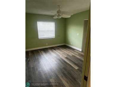 Beautifully updated, 2/2 first floor corner unit condo in King's on  in Florida - for sale on GolfHomes.com, golf home, golf lot