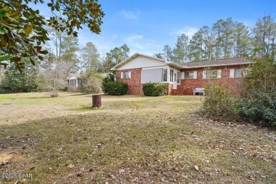 Discover the perfect blend of comfort and tranquility in this on Dogwood Lakes Golf Club in Florida - for sale on GolfHomes.com, golf home, golf lot