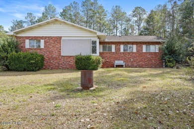 Discover the perfect blend of comfort and tranquility in this on Dogwood Lakes Golf Club in Florida - for sale on GolfHomes.com, golf home, golf lot