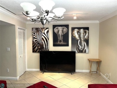 This charming 2-bedroom, 1.5-bath corner-unit townhome offers on Colony West Country Club in Florida - for sale on GolfHomes.com, golf home, golf lot