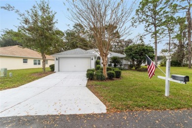 Charming 3-Bedroom, 2-Bath Home in Oak Run - A Premier 55+ Golf on Royal Oaks Golf Club in Florida - for sale on GolfHomes.com, golf home, golf lot