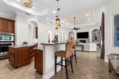Welcome to 186 Portofino Drive, a grand Donato model estate on Venetian Golf and River Club in Florida - for sale on GolfHomes.com, golf home, golf lot