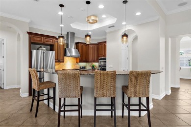 Welcome to 186 Portofino Drive, a grand Donato model estate on Venetian Golf and River Club in Florida - for sale on GolfHomes.com, golf home, golf lot