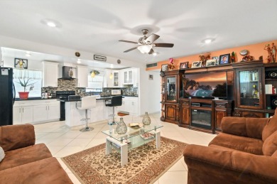otally turnkey f, contemporary condominium in gated Kings Point on Kings Point Golf -Flanders Way in Florida - for sale on GolfHomes.com, golf home, golf lot