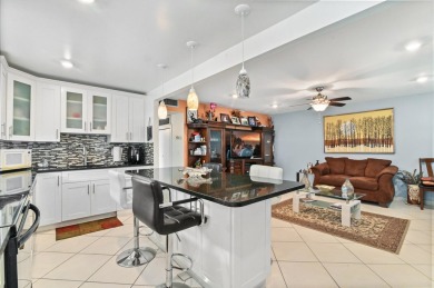 otally turnkey f, contemporary condominium in gated Kings Point on Kings Point Golf -Flanders Way in Florida - for sale on GolfHomes.com, golf home, golf lot