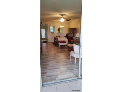 Sacious 1 Bedroom 1.5 baths 55+ Communty in Sunrise Lakes Phase on Sunrise Lakes Phase III in Florida - for sale on GolfHomes.com, golf home, golf lot