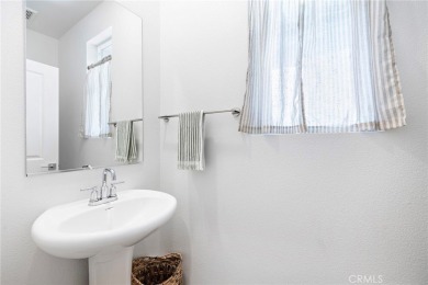 This stunning 3 bedroom plus loft detached home with solar on Glen Ivy Golf Club in California - for sale on GolfHomes.com, golf home, golf lot