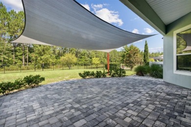 BRAND NEW ROOF on this IMMACULATE 2335 square foot spacious home on Golf Club At North Hampton in Florida - for sale on GolfHomes.com, golf home, golf lot