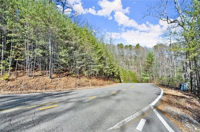 Own the Horizon: Premier 1.46-Acre High Gap Lot with Unrivaled on Big Canoe Golf Club - Cherokee in Georgia - for sale on GolfHomes.com, golf home, golf lot