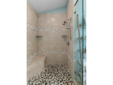 Beautifully updated and impeccably maintained, this 4-bedroom on Grand Haven Golf Club in Florida - for sale on GolfHomes.com, golf home, golf lot