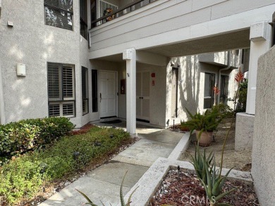 This beautifully appointed 2-bedroom, 2-bathroom condo offers a on Mission Viejo Country Club in California - for sale on GolfHomes.com, golf home, golf lot