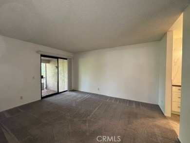 This beautifully appointed 2-bedroom, 2-bathroom condo offers a on Mission Viejo Country Club in California - for sale on GolfHomes.com, golf home, golf lot