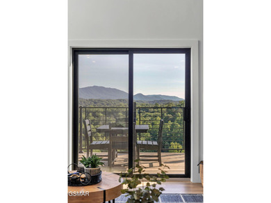 Indoor Pool, Spectacular Mtn Views, Game Room, Hot Tub, Fire on Sevierville Golf Club in Tennessee - for sale on GolfHomes.com, golf home, golf lot