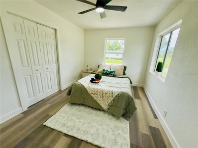 Nestled in the tranquil Edgemoor Estates neighborhood, this cozy on Mangrove Bay Golf Course in Florida - for sale on GolfHomes.com, golf home, golf lot