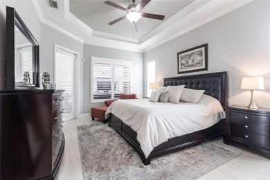 Experience the ultimate Florida lifestyle in the exclusive award on Pelican Pointe Golf and Country Club in Florida - for sale on GolfHomes.com, golf home, golf lot