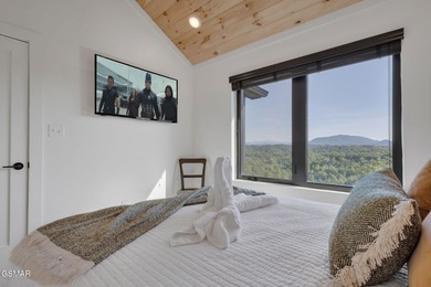 Indoor Pool, Spectacular Mtn Views, Game Room, Hot Tub, Fire on Sevierville Golf Club in Tennessee - for sale on GolfHomes.com, golf home, golf lot