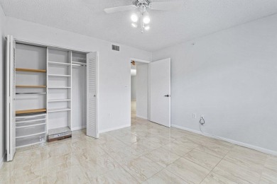 You are going to fall in love with this stunning 2/2 condo in on Fountains Golf and Country Club in Florida - for sale on GolfHomes.com, golf home, golf lot
