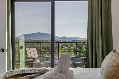 Indoor Pool, Spectacular Mtn Views, Game Room, Hot Tub, Fire on Sevierville Golf Club in Tennessee - for sale on GolfHomes.com, golf home, golf lot