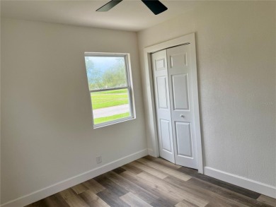 Nestled in the tranquil Edgemoor Estates neighborhood, this cozy on Mangrove Bay Golf Course in Florida - for sale on GolfHomes.com, golf home, golf lot