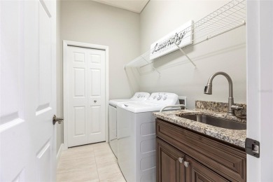 Experience the ultimate Florida lifestyle in the exclusive award on Pelican Pointe Golf and Country Club in Florida - for sale on GolfHomes.com, golf home, golf lot