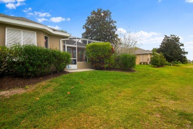 Nestled in the heart of Viera East Golf Course, this villa on Viera East Golf Club in Florida - for sale on GolfHomes.com, golf home, golf lot