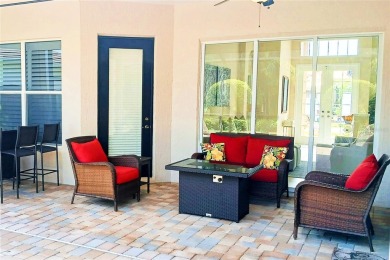 Experience the ultimate Florida lifestyle in the exclusive award on Pelican Pointe Golf and Country Club in Florida - for sale on GolfHomes.com, golf home, golf lot