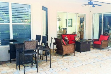 Experience the ultimate Florida lifestyle in the exclusive award on Pelican Pointe Golf and Country Club in Florida - for sale on GolfHomes.com, golf home, golf lot