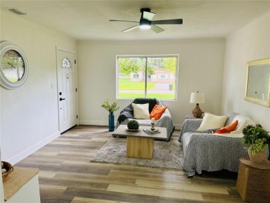 Nestled in the tranquil Edgemoor Estates neighborhood, this cozy on Mangrove Bay Golf Course in Florida - for sale on GolfHomes.com, golf home, golf lot