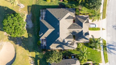 Nestled in the heart of Viera East Golf Course, this villa on Viera East Golf Club in Florida - for sale on GolfHomes.com, golf home, golf lot