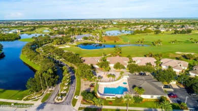 Nestled in the heart of Viera East Golf Course, this villa on Viera East Golf Club in Florida - for sale on GolfHomes.com, golf home, golf lot