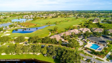 Nestled in the heart of Viera East Golf Course, this villa on Viera East Golf Club in Florida - for sale on GolfHomes.com, golf home, golf lot