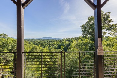 Indoor Pool, Spectacular Mtn Views, Game Room, Hot Tub, Fire on Sevierville Golf Club in Tennessee - for sale on GolfHomes.com, golf home, golf lot