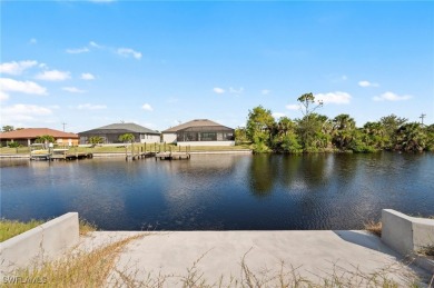 SAILBOAT ACCESS lot! Seawall and Concrete DOCK in place on 100 on Burnt Store Golf Club in Florida - for sale on GolfHomes.com, golf home, golf lot