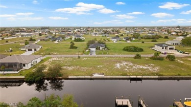 SAILBOAT ACCESS lot! Seawall and Concrete DOCK in place on 100 on Burnt Store Golf Club in Florida - for sale on GolfHomes.com, golf home, golf lot