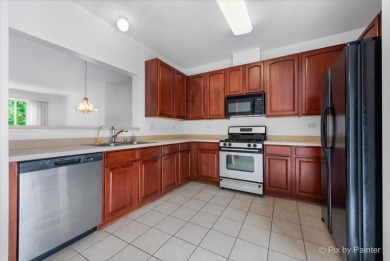 Welcome to this move-in ready 3-bedroom, 2.1-bath townhome in on Cary Country Club in Illinois - for sale on GolfHomes.com, golf home, golf lot