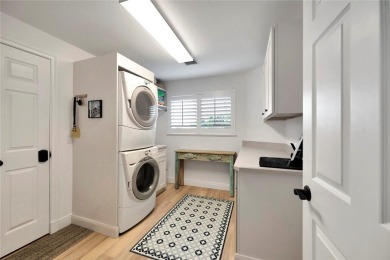 Coventry Island stunner! This 3BR/3BA home with a 3-car on  in Florida - for sale on GolfHomes.com, golf home, golf lot