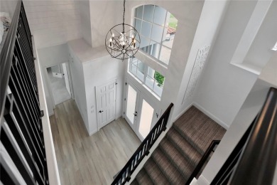 Coventry Island stunner! This 3BR/3BA home with a 3-car on  in Florida - for sale on GolfHomes.com, golf home, golf lot