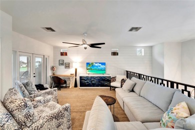 Coventry Island stunner! This 3BR/3BA home with a 3-car on  in Florida - for sale on GolfHomes.com, golf home, golf lot