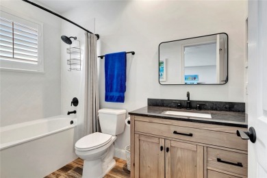 Coventry Island stunner! This 3BR/3BA home with a 3-car on  in Florida - for sale on GolfHomes.com, golf home, golf lot