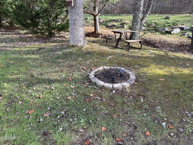 Nice RV lot surrounded by beautiful shade trees giving you the on Bent Creek Golf Course in Tennessee - for sale on GolfHomes.com, golf home, golf lot