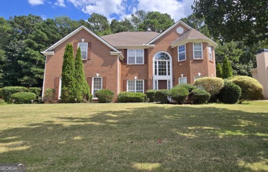 Welcome to this spacious 4-bedroom, 2.5-bath home perfectly on Indian Creek Golf Club in Georgia - for sale on GolfHomes.com, golf home, golf lot