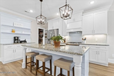 Introducing an exquisite coastal retreat, where luxury meets on Founders Club At St. James Plantation in North Carolina - for sale on GolfHomes.com, golf home, golf lot