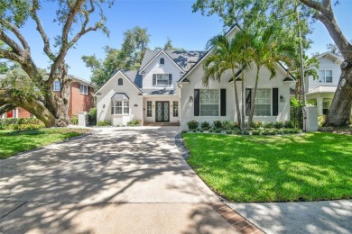 Step into this beautifully renovated 4-bedroom, 3.5-bath home in on Palma Ceia Golf and Country Club in Florida - for sale on GolfHomes.com, golf home, golf lot