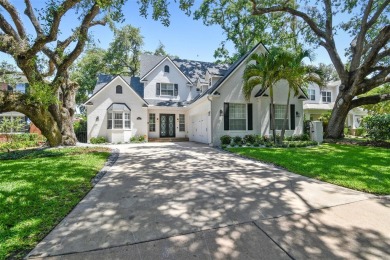 Step into this beautifully renovated 4-bedroom, 3.5-bath home in on Palma Ceia Golf and Country Club in Florida - for sale on GolfHomes.com, golf home, golf lot