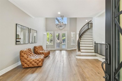 Step into this beautifully renovated 4-bedroom, 3.5-bath home in on Palma Ceia Golf and Country Club in Florida - for sale on GolfHomes.com, golf home, golf lot