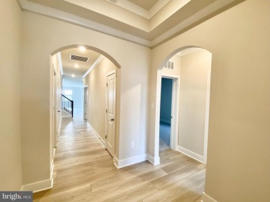 MOVE IN READY-FINISHED BASEMENT AND UPPER LEVEL!  Photos are of on Plantation Lakes Golf and Country Club in Delaware - for sale on GolfHomes.com, golf home, golf lot