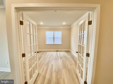 MOVE IN READY-FINISHED BASEMENT AND UPPER LEVEL!  Photos are of on Plantation Lakes Golf and Country Club in Delaware - for sale on GolfHomes.com, golf home, golf lot