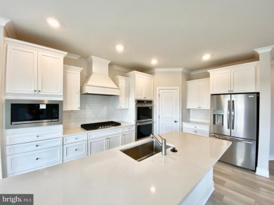 MOVE IN READY-FINISHED BASEMENT AND UPPER LEVEL!  Photos are of on Plantation Lakes Golf and Country Club in Delaware - for sale on GolfHomes.com, golf home, golf lot