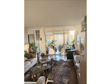 Live in elegance in this beautifully remodeled home in a gated on Inverrary Country Club in Florida - for sale on GolfHomes.com, golf home, golf lot